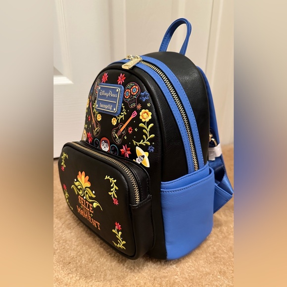 Coco themed Disney Parks Loungefly backpack - Picture 2 of 7